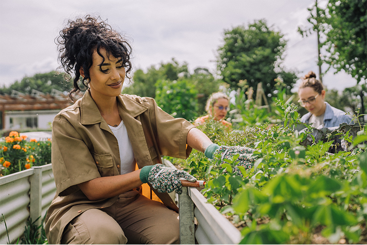 A woman gardening outside